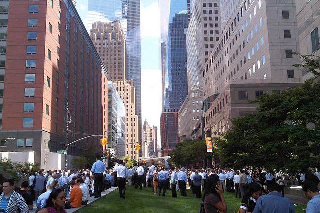 Financial District workers stand around outside after the quake